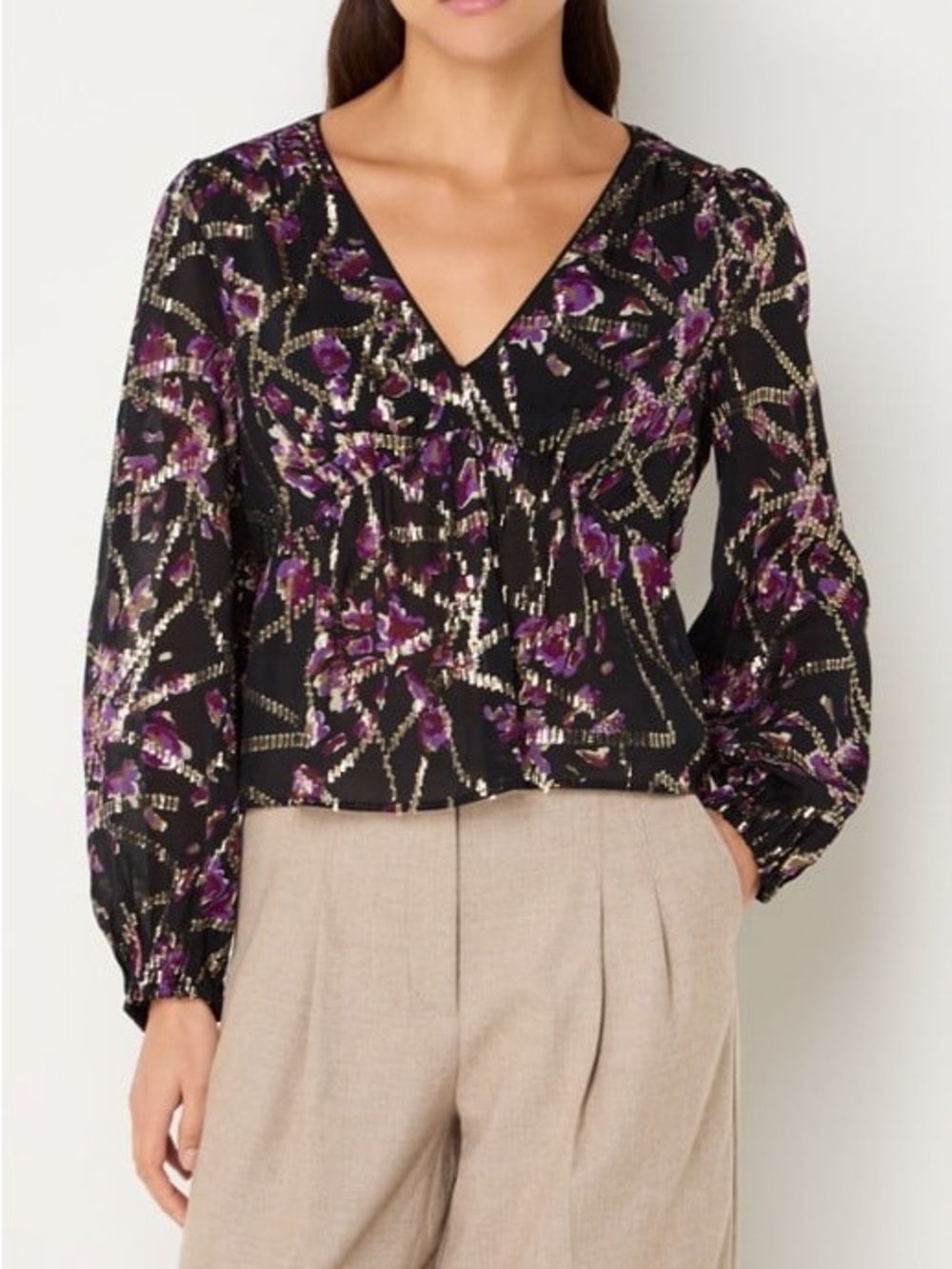 The Ba&sh Divine Top is a Parisian-designed, long-sleeved silk-blend blouse